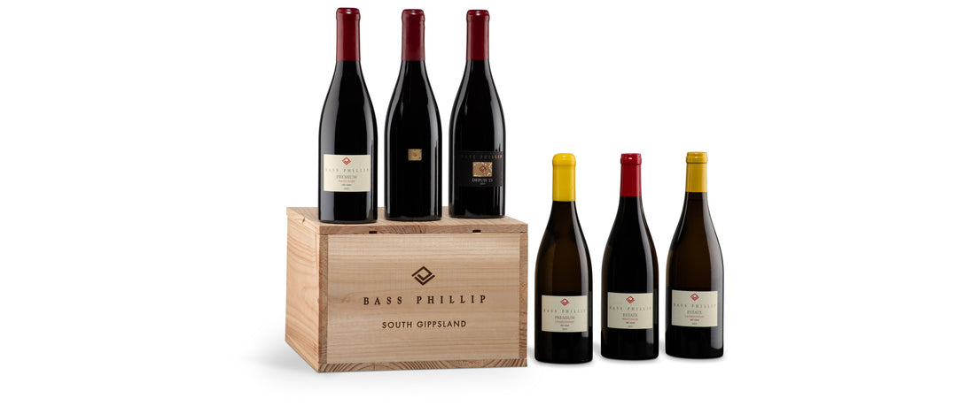 Six bottles of Bass Phillip 2023 Pinot Noir and Chardonnay with the estate's wooden case